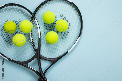 Tennis ball and racket isolated background. Top view