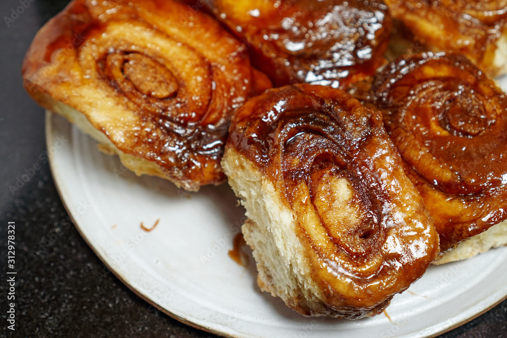 Homemade sticky buns on a plate Homemade sticky buns on a plate