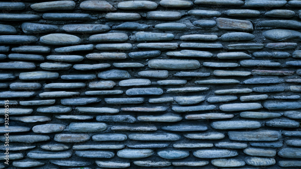 Peddle stone wall texture background Peddle stone wall texture background