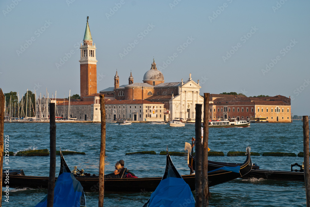 Venice, Italy: traditional Gondola on Giudecca Canal with San Giorgio Maggiore church in the background, San Marco