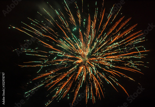 Colorful New Year Eve fireworks in the night sky