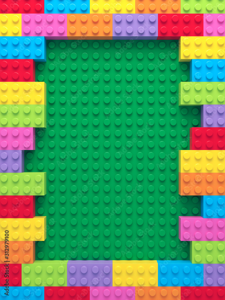 Frame of colorful toy bricks on green construction plate - obrazy, fototapety, plakaty 
