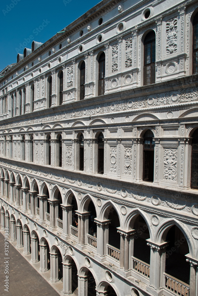 Venice, Italy: closeup of white Doge's Palace white tracery facade.