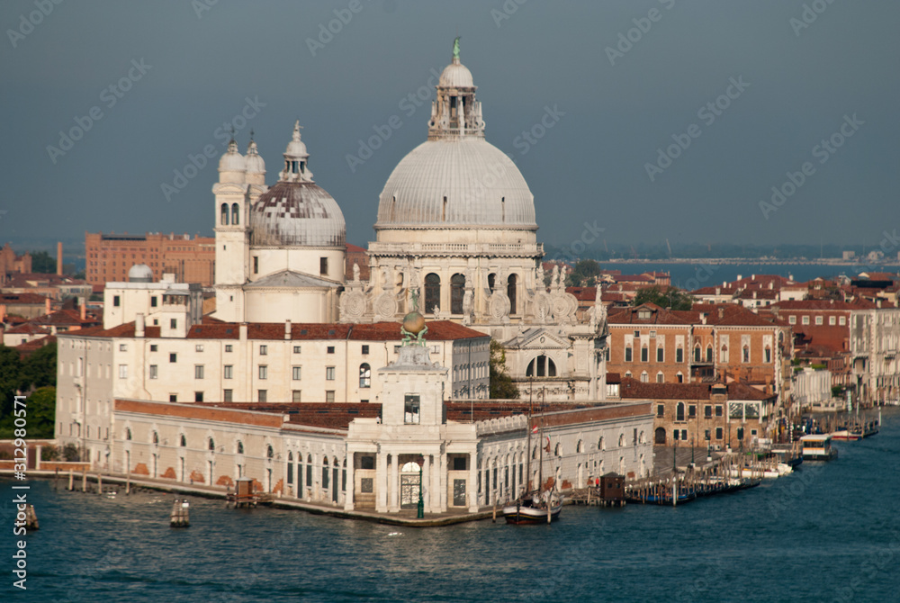 Venice, Italy: Basilica di Santa Maria della Salute und Punta della Dogana, Grand Canal. In the morning sun