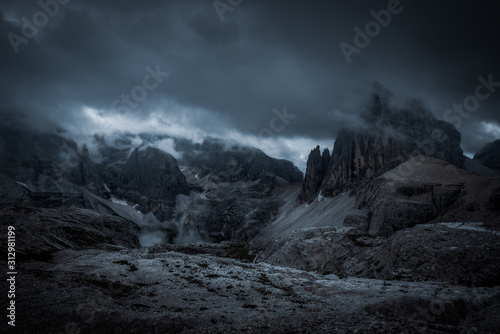 dark mountains and heavy clouds photo