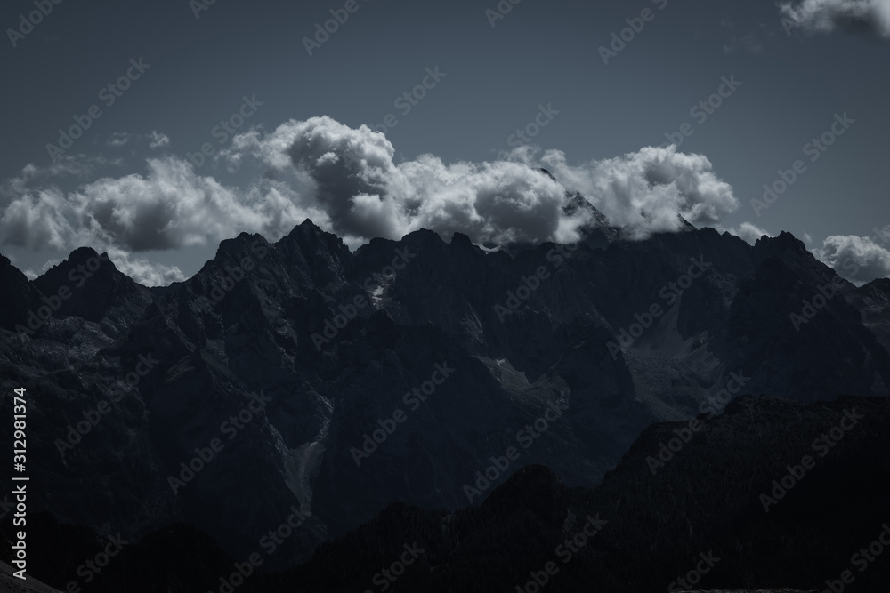 dark mountains and heavy clouds