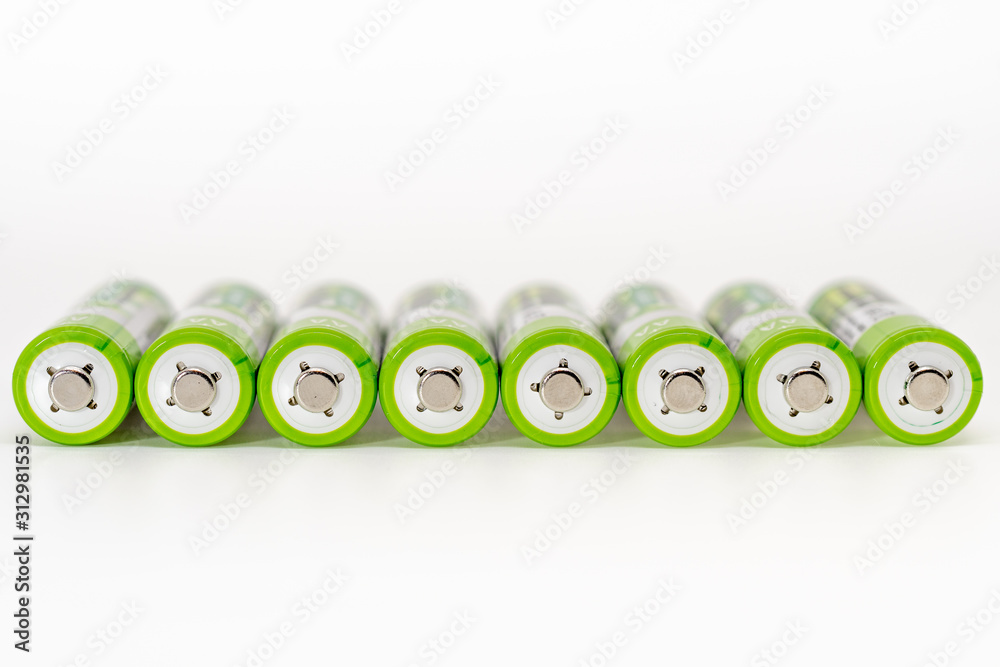 plus pole of batteries in a row - white background plus pole of batteries in a row - white background