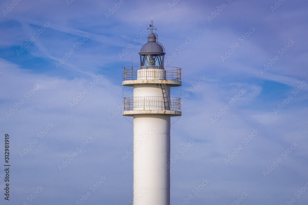 Close up on a lighthouse located on Ajo Cape near Ajo village in Cantabria, Spain