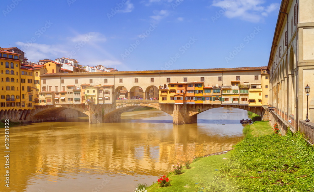 Medieval stone bridge Ponte Vecchio over Arno river in Florence, Tuscany, Italy