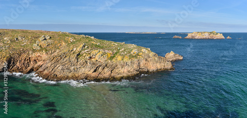 Panoramic view at islets Cenis at left and Guric at right from western coast of Houat island in French Brittany.