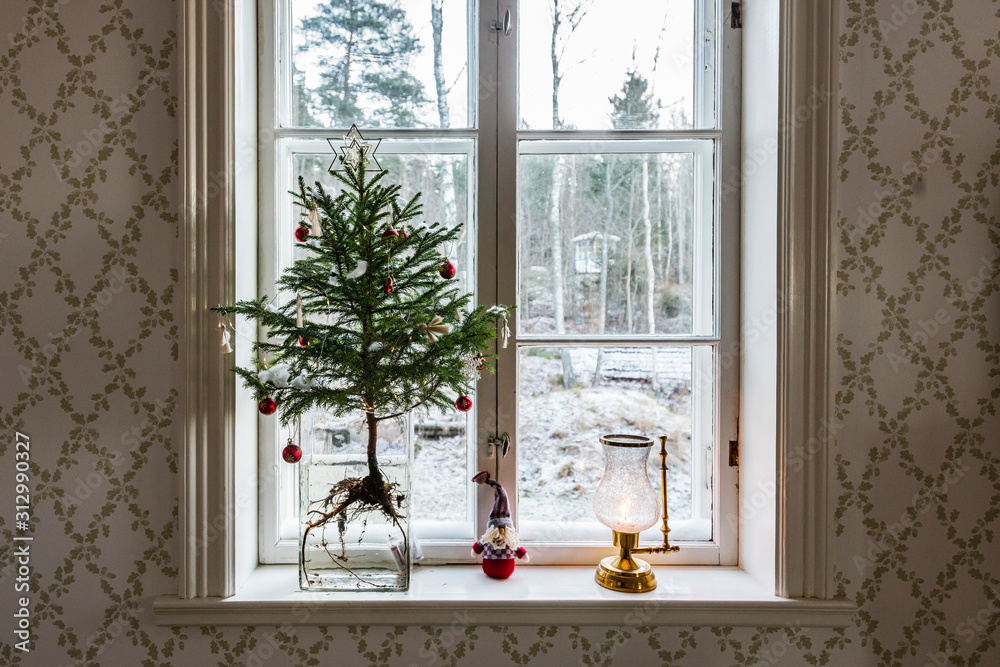 Christmas tree on windowsill Christmas tree on windowsill
