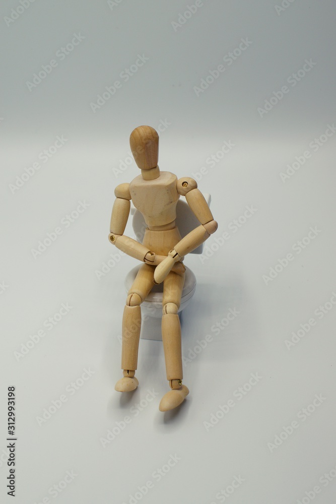Drawing Mannequin sitting on toilet in distress Drawing Mannequin sitting on toilet in distress