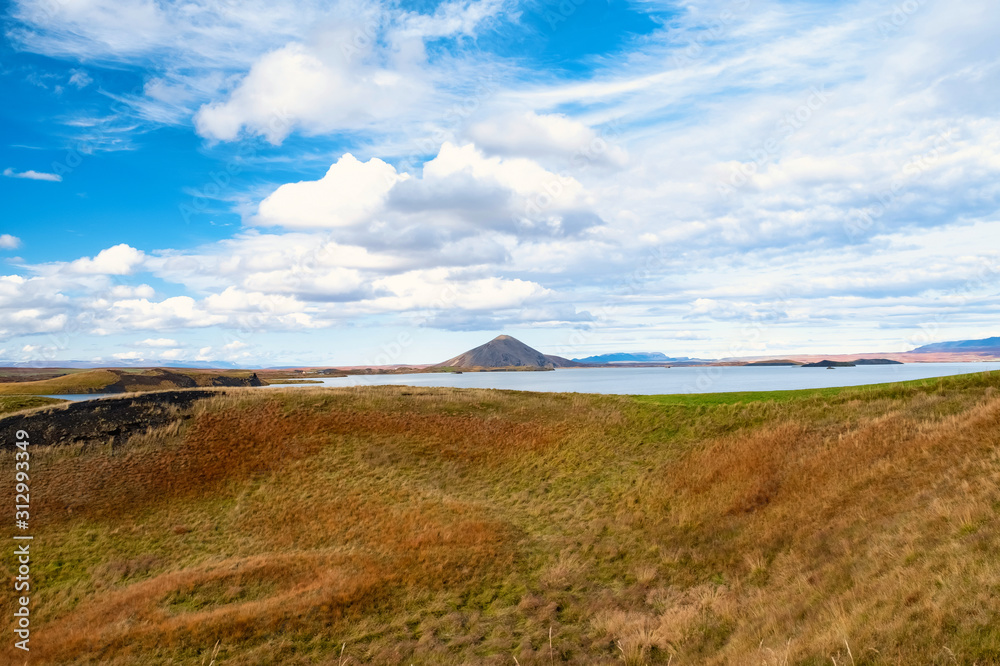 Idyllic landscape in nice colors, blue and yellow, Lake Mývatn in autumn colors,low perspective, Iceland 