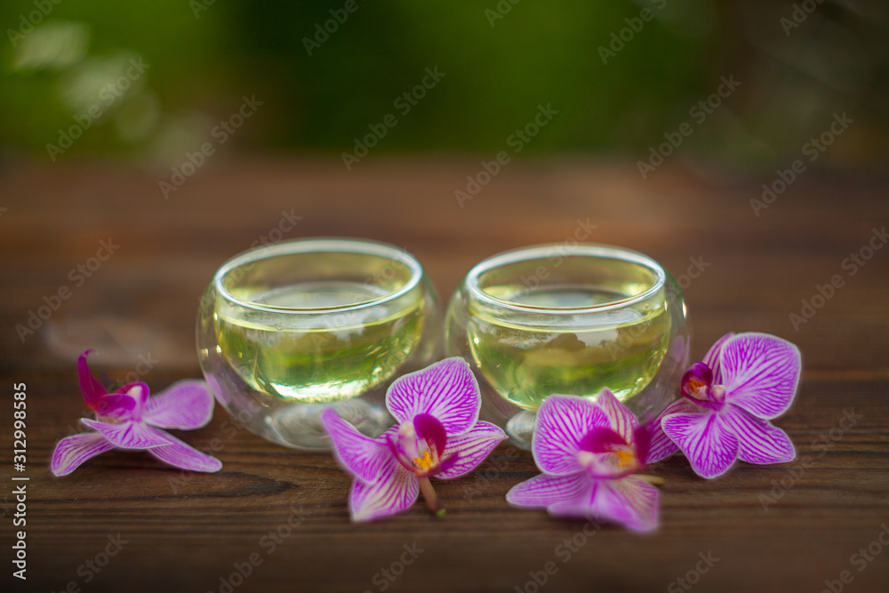 delicious green tea in beautiful glass bowl on table delicious green tea in beautiful glass bowl on table