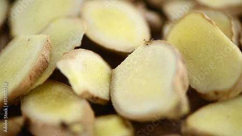 Portion of Ginger on a rotating wooden plate (close-up and seamless loopable)