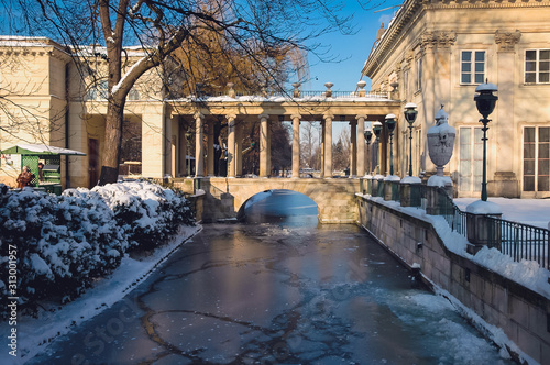 Bridge of Palace on the Water in Royal Baths Park or Lazienki Park in Warsaw, capital of Poland