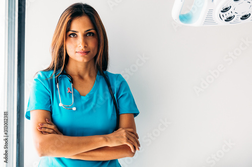 Portrait of nurse in medical room photo