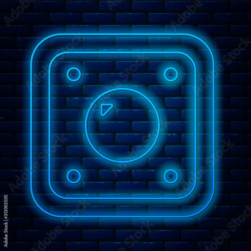 Glowing neon line Electric light switch icon isolated on brick wall background. On and Off icon. Dimmer light switch sign. Concept of energy saving. Vector Illustration