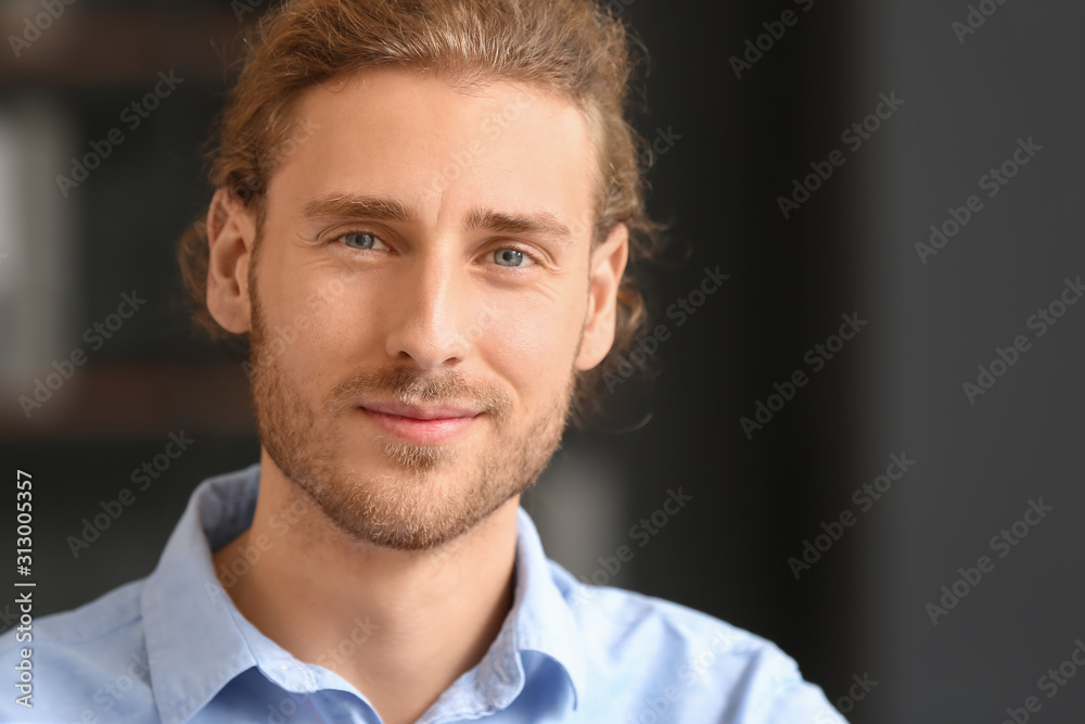 Portrait of handsome businessman in office Portrait of handsome businessman in office