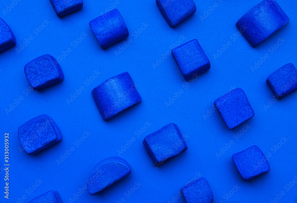 Blue marshmallows on color background Blue marshmallows on color background