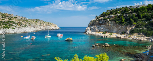 Beautiful turquoise water at Anthony Quinn Bay Rhodes Island Rodos Greece Europe photo