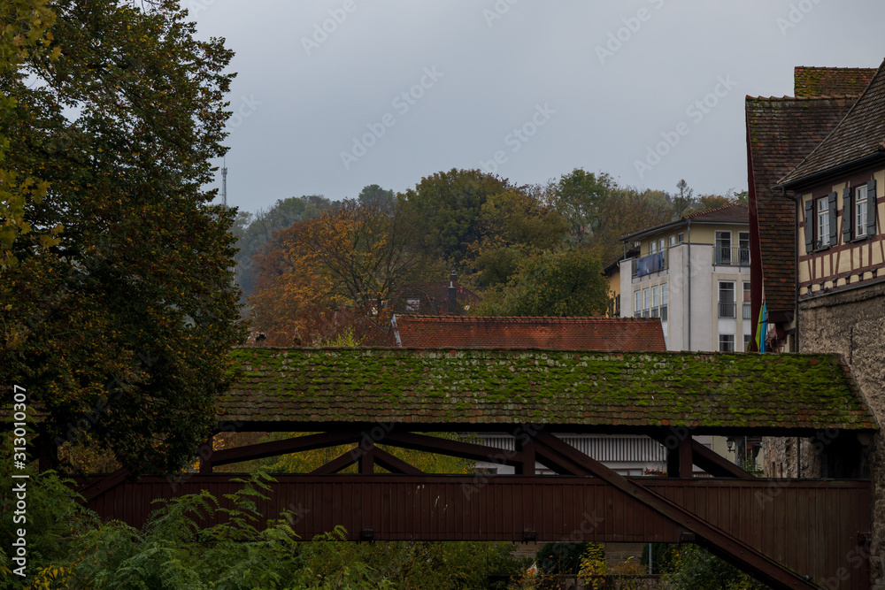 Covered bridge over Kocher river in Schwäbisch Hall Germany
