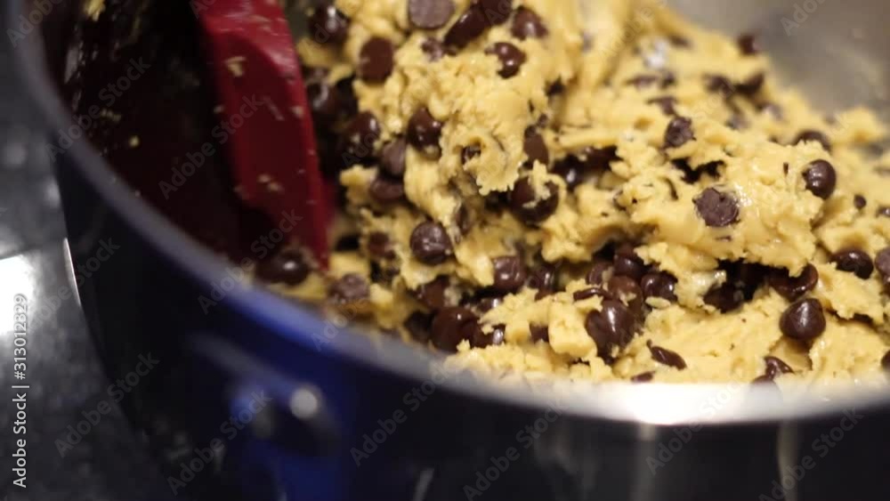 Mixing chocolate chip cookie dough
