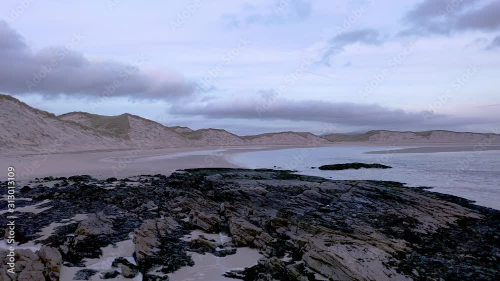 The landscape of the Sheskinmore bay next to the Nature Reserve between Ardara and Portnoo in Donegal - Ireland The landscape of the Sheskinmore bay next to the Nature Reserve between Ardara and Portnoo in Donegal - Ireland