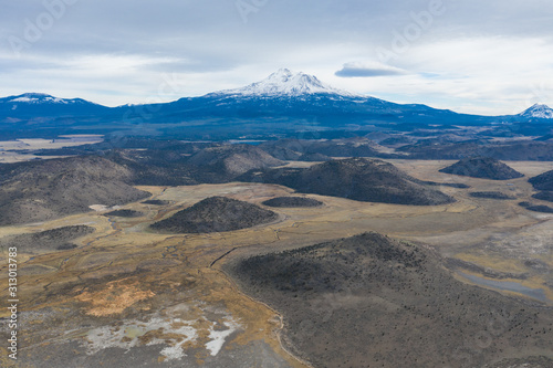 Mount Shasta in northern California is among the largest and most active volcanoes in the Cascade Range. The peak reaches 14,160 feet and the summit is covered with snow throughout the year.