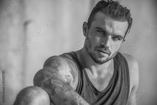 Handsome and fit Caucasian male on the beach