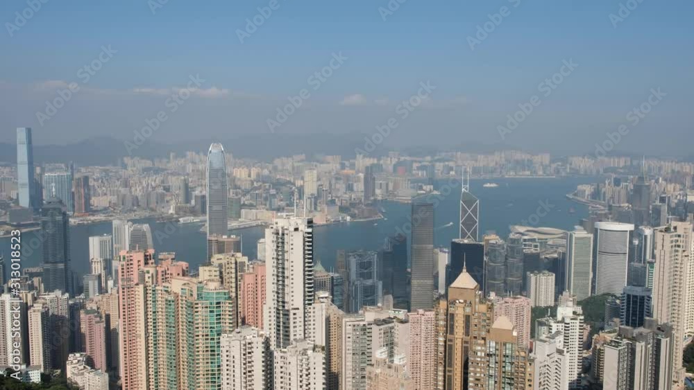 Aerial skyline of HongKong, view from Victoria Peak on a sunny day Aerial skyline of HongKong, view from Victoria Peak on a sunny day