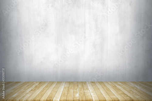 Wood table top with concrete wall background. Used for product placement or montage.