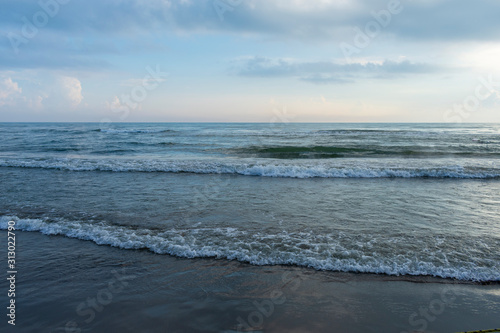 Playa y océanos con tonos azules al amanecer, en Tecolutla Veracruz, México photo