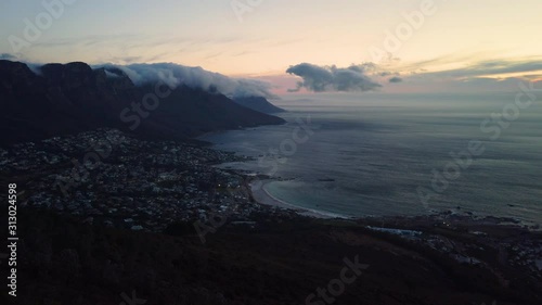 Wide view of beaches and coastline near Cape Town from Lion's Head after sunset