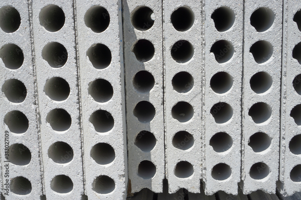 A heap of precast concrete material with hole on the side for building construction
