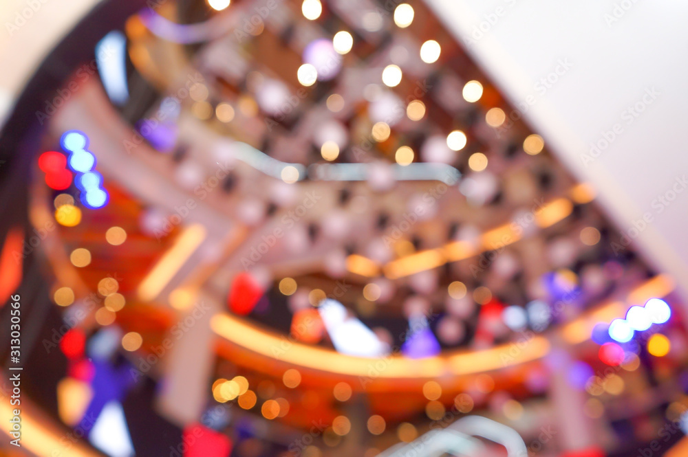 Abstract bokeh and blur colourful department store hall with red orange yellow purple color. Abstract bokeh and blur colourful department store hall with red orange yellow purple color.