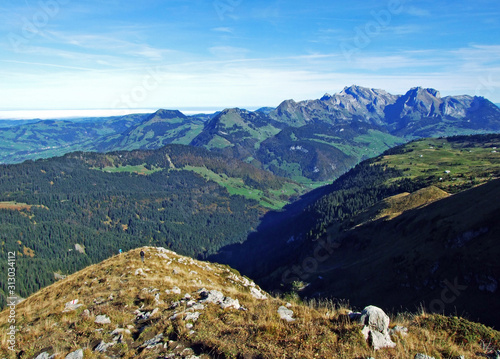 Panorama from the alpine peak Leistchamm situated above the Wahlensee Lake and in the Churfirsten mountain range, Starkenbach - Canton of St. Gallen, Switzerland photo