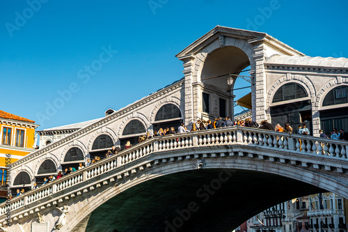 View of Rialto bridge locate in grand canal late morning before autumn season in Venice , Italy