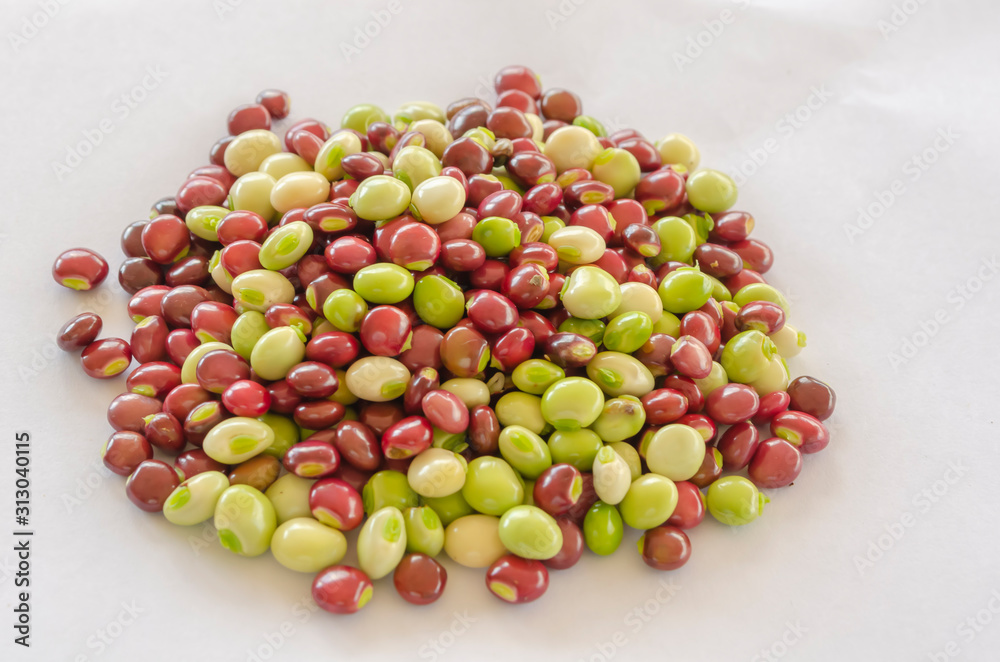 Red And Green Pigeon Peas Against White Background Red And Green Pigeon Peas Against White Background