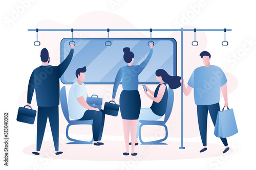 Humans sitting and standing in metro. People using public transportation. Scene in transport.
