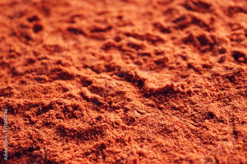 Background of Red Chilli Pepper Powder Also Know as Mirchi, Mirchi Powder, Lal Mirchi, Mirch or Laal Mirchi. paprika Powder background
