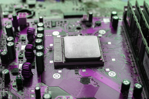 the cpu processor installed in the computer, close up, with rgb color light