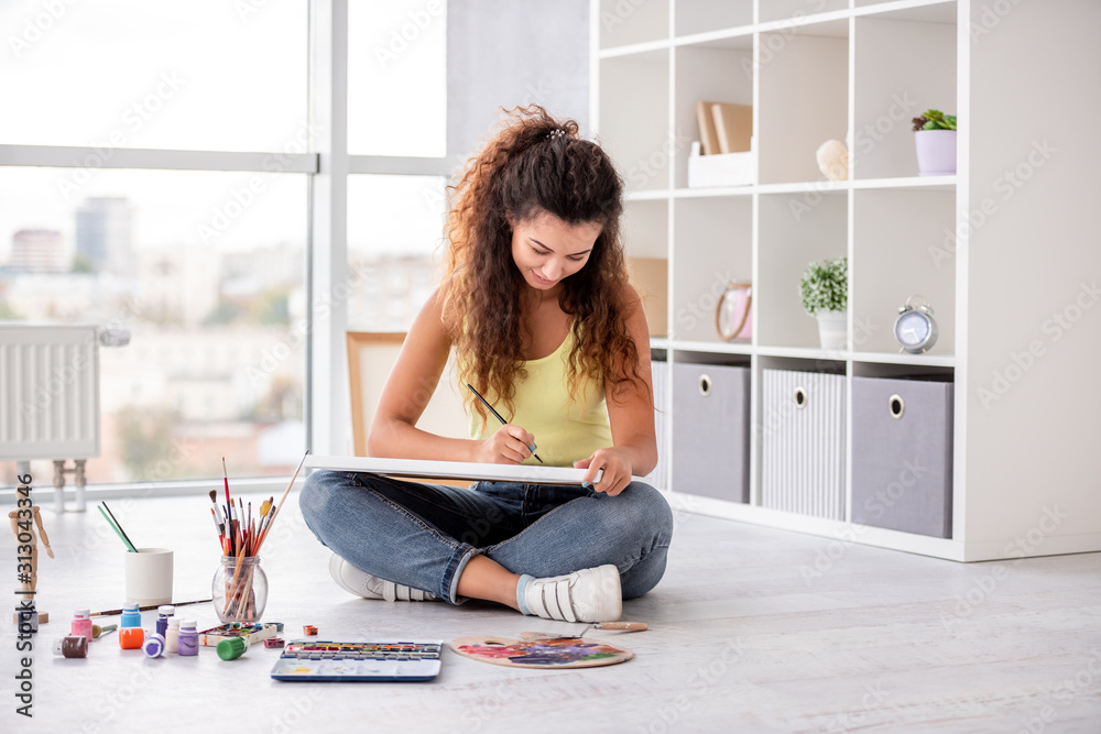 Cute girl painting in workshop Cute girl painting in workshop