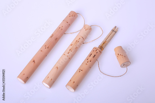 Bamboo handcraft an image showing three exotic traditional letter cover from Indonesia on white background