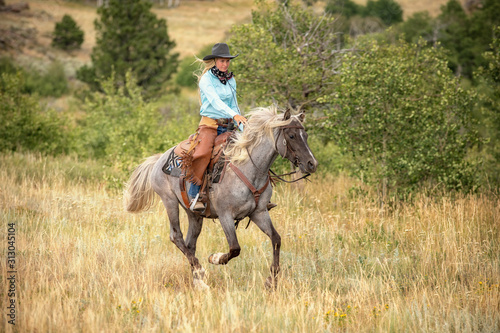 Cow Girl On Rocky Mountain Horse © Terri Cage 