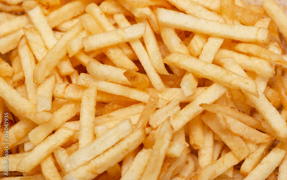 thin straw fried potatoes on a white background thin straw fried potatoes on a white background
