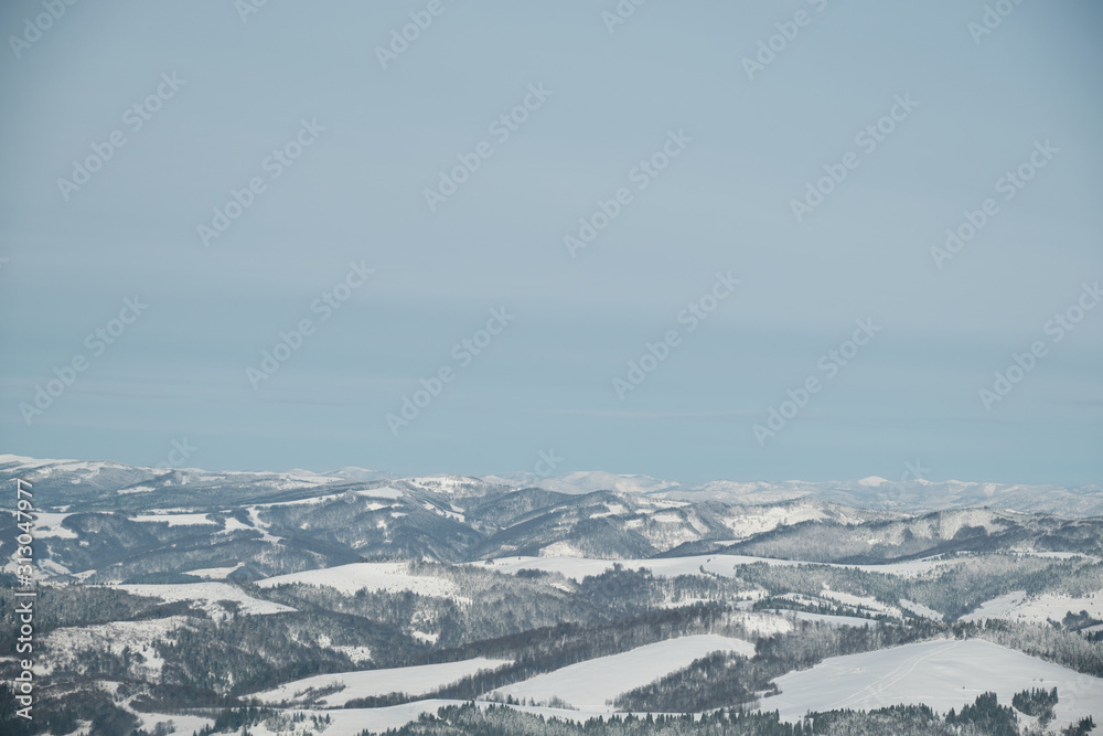 Naklejka premium Winter mountains landscape. Karphatians wiev. Karpaty