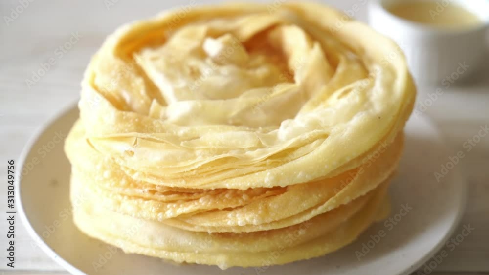 fried crispy roti dough with sweetened condensed milk fried crispy roti dough with sweetened condensed milk