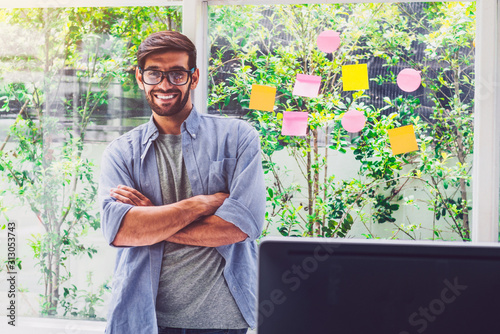 A man happy and smile at home office.