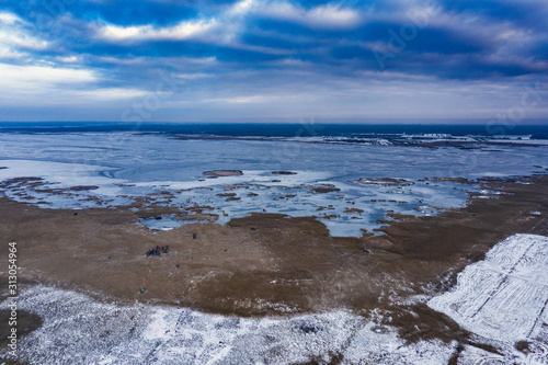 Cold winter landscape in evening time.